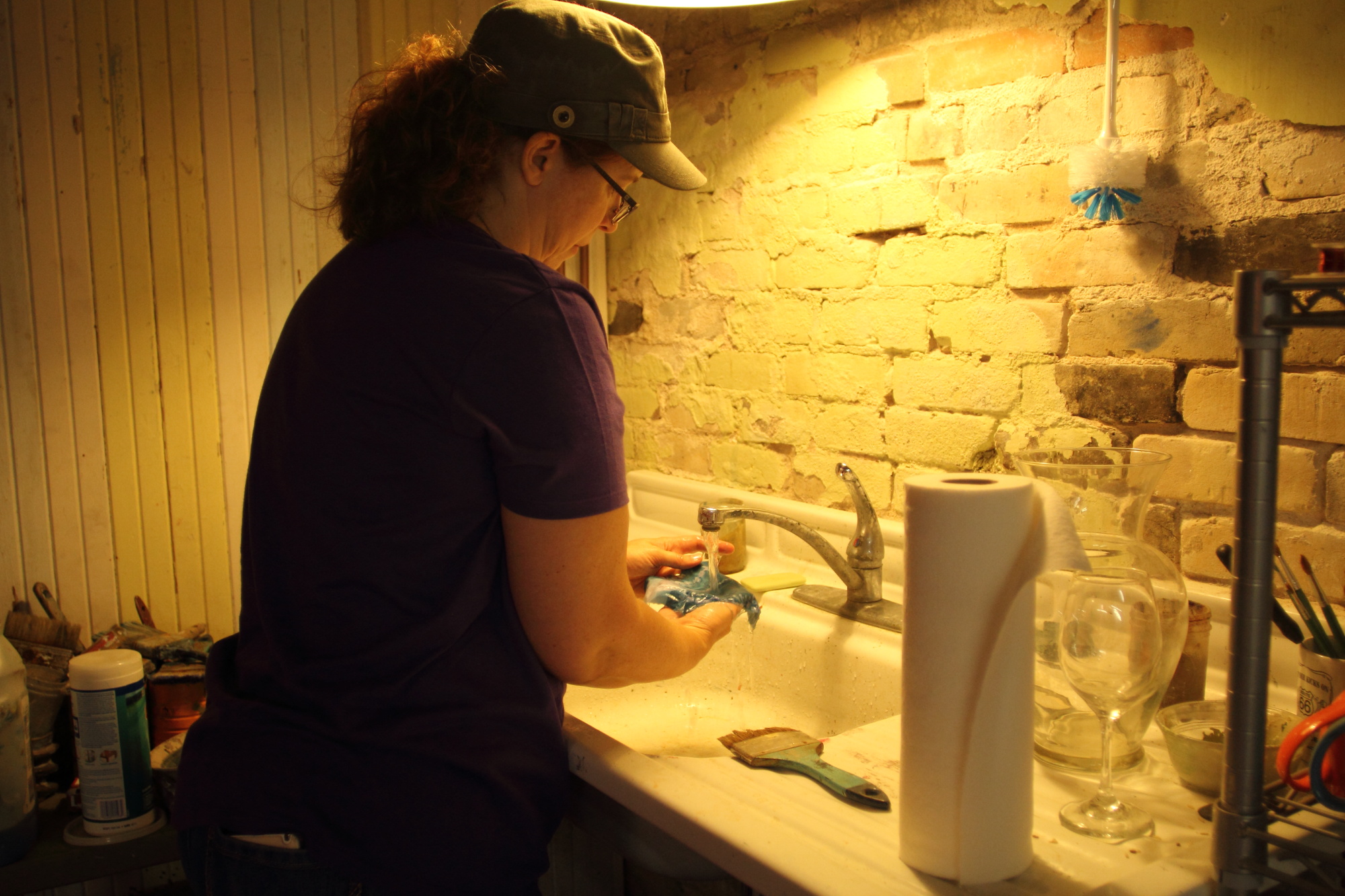 Sally washing out a cyanotype&nbsp;