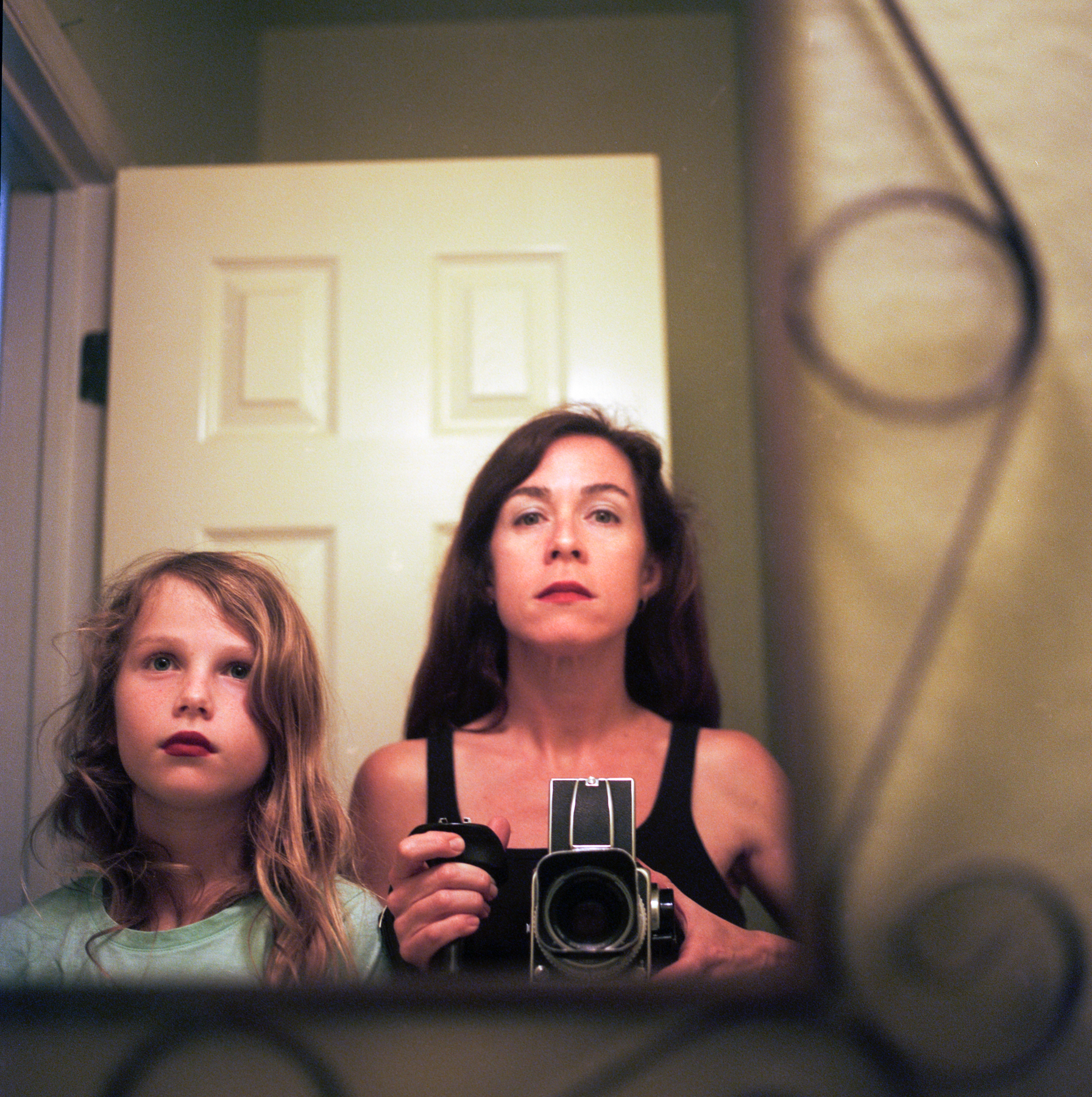  I received a lipstick sample that ended up being way too vibrant and totally the wrong color for me. &nbsp;When I came out of the bathroom and showed it to Louise, she said "WHOA! &nbsp;Can I try some?" &nbsp;I followed her with my camera and sugges